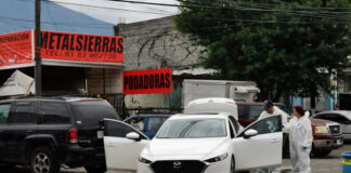 Pareja es atacada a balazos en una vulcanizadora de Guadalupe.